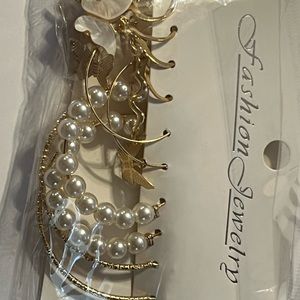 A card of multiple fashion hoop and dangle earrings